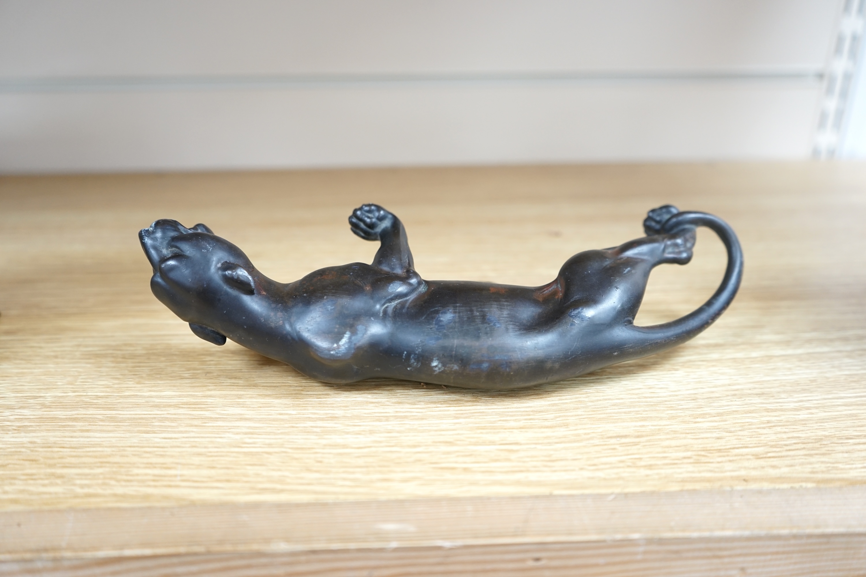 A small bronzed model of a Panther, 25cm long. Condition - some slight scuffing to surface